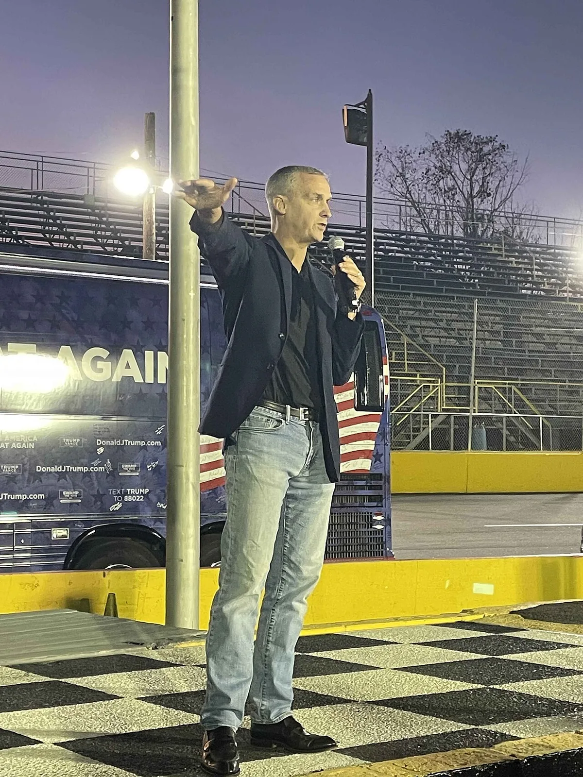 Corey Lewandowski speaking at a Team Trump bus tour rally at Wake County Speedway in North Carolina, Oct. 17, 2024